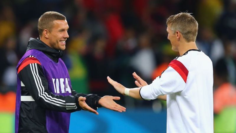 Lukas Podolski und Bastian Schweinsteiger 2014 in Brasilien