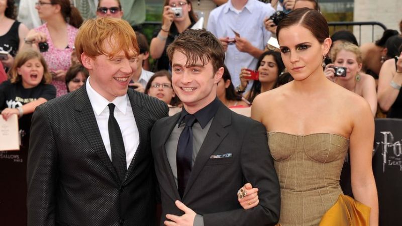 Rupert Grint, Daniel Radcliffe und Emma Watson im Juli 2011